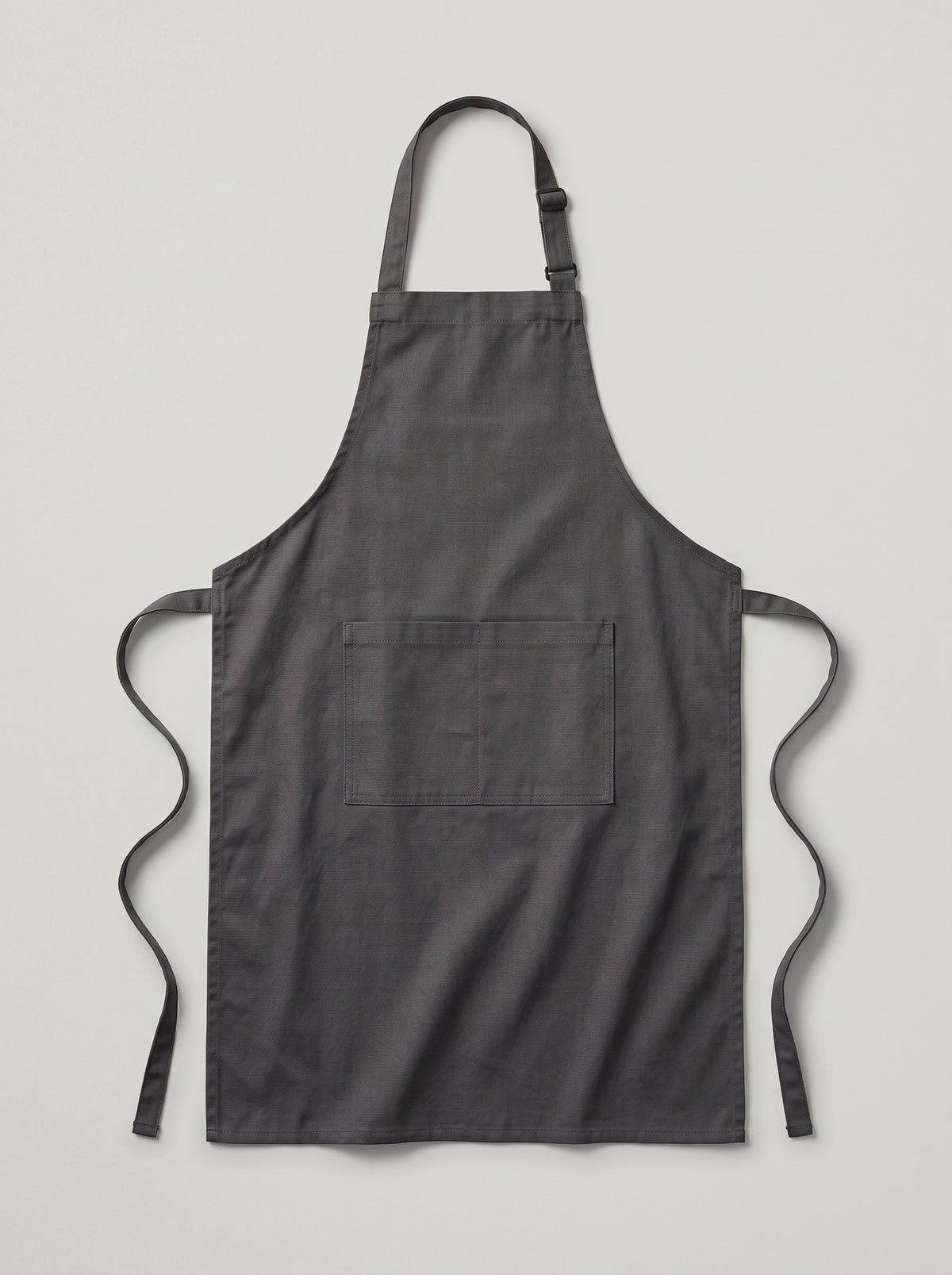 Delantal personalizado con bolsillo en gris oscuro, 90x75 cm